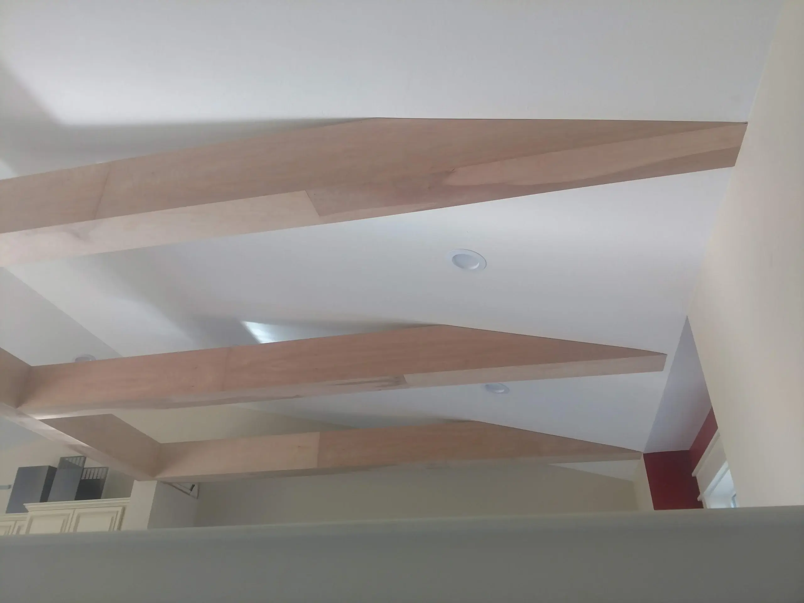 Stained wood ceiling beams