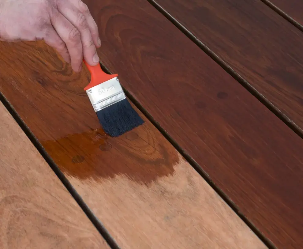 Coating being applied to a surface